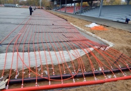 Работы по обустройству искусственного покрытия на стадионе “Москвич” практически завершены